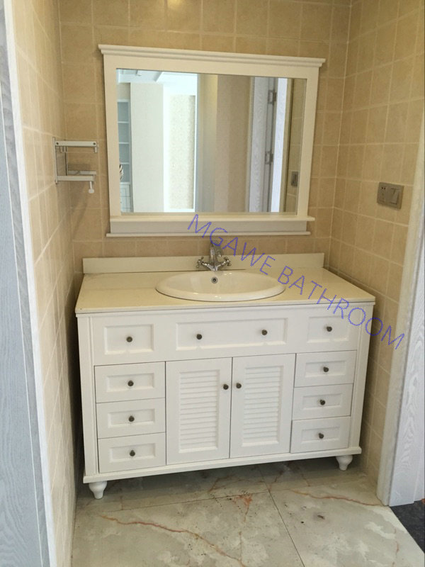 white custom bathroom vanity with black handle